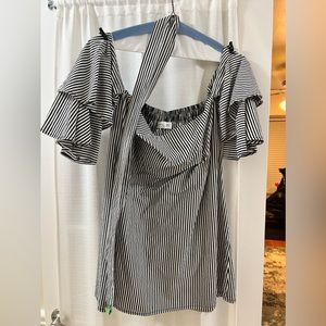 Faithfull dress. Perfect condition. Comes with belt. Mini dress. Size 6